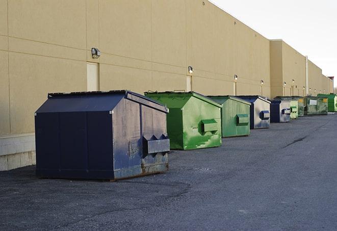 dumpsters with safety cones in a construction area in Esopus, NY