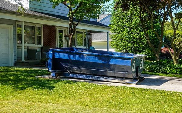 residential dumpsters can be placed on a driveway or yard, but preventative measures must be required to avoid damage to the property